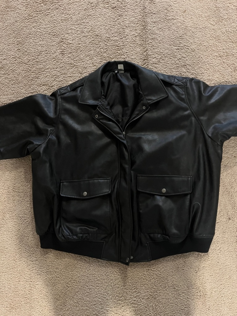 Woman’s looks like leather, bomber jacket